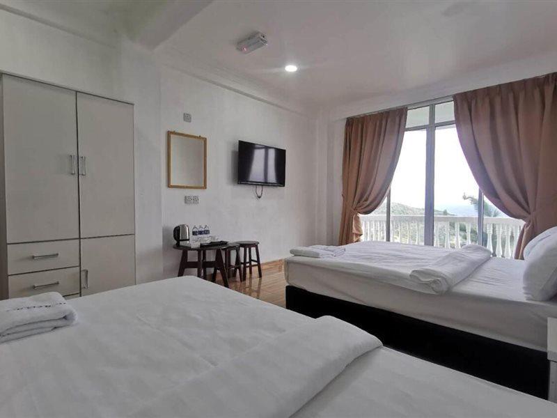 Oyo 90043 Jasni Rijan Resort Ranau Bagian luar foto